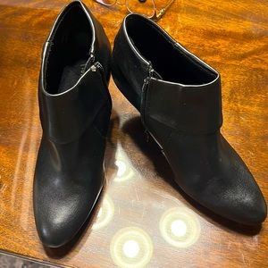 Black booties with zip